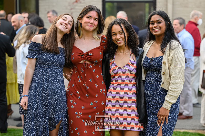From left to right, seniors Kasey Corra, Tess Farr, Erica Brown, and Spandana Vagwala pose together at their senior dinner. 