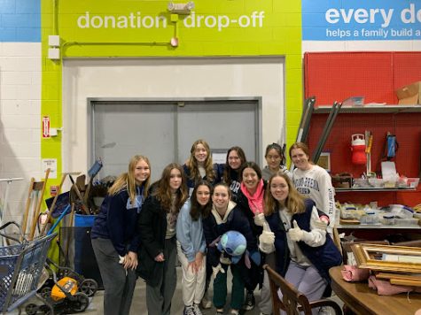 A group of seniors went to habitat for humanity to help in their warehouse