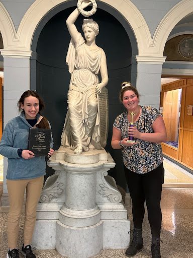 Gabriella Dansereau ‘26 (left), and I, Kristina Klauzinski (right), posing with our well-fought-for awards (brought back some hardware for Montrose… yay!) 