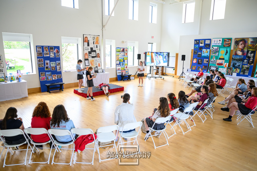  Students participate in a Merrie Month of May Shakespeare performance.
