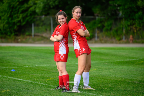 Wendy Jacobi ‘23 and Ava Ryan ‘23 pose for a photo before a game against Gann Academy
