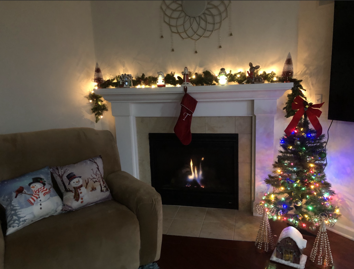 A cozy fireplace decorated for Christmas