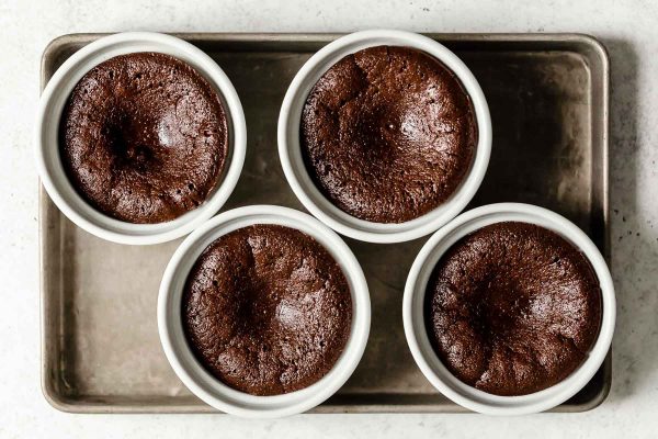 A batch of delicious flourless chocolate cakes, straight from the oven