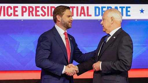 Governor Tim Walz and Vice Presidential Candidate JD Vance shake hands before the debate.