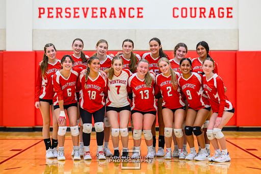 Montrose Varsity Volleyball team poses after winning in straight sets at their game against Chapel-Hill Chauncy Hall.
