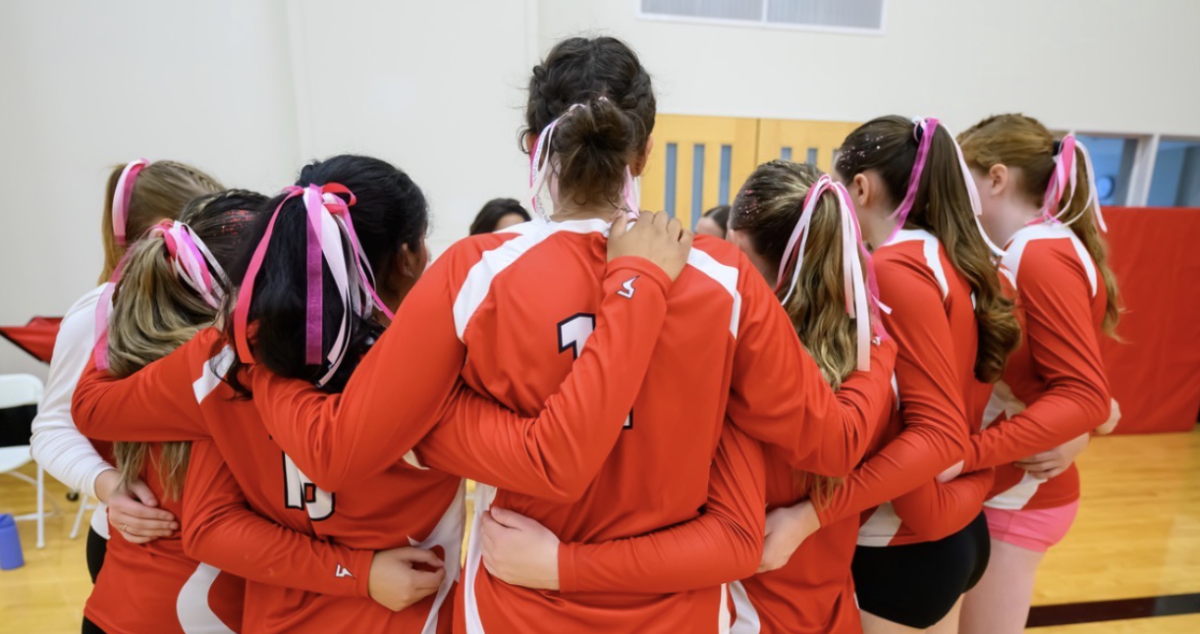 Varsity Volleyball Athletes during their Homecoming Game.