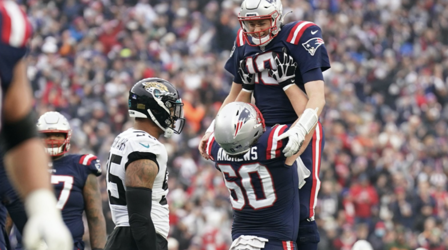 New England Patriots quarterback Mac Jones celebrates a touchdown pass in a huge win against the Jacksonville Jaguars.