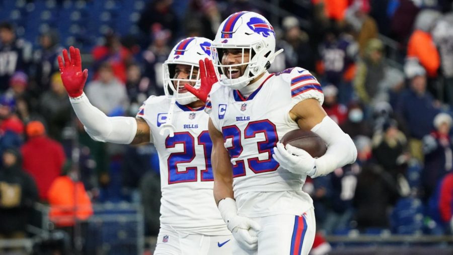 Buffalo Bills defenders Jordan Poyer (left) and Micah Hyde (right) celebrate after Hyde’s interception of Mac Jones’ pass during the final seconds of the game, when the Patriots were desperate to score.
