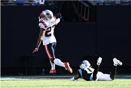 JC Jackson returns an interception eighty-eight yards for a touchdown. Panthers receiver Robby Anderson dives in an attempt to take Jackson down.
